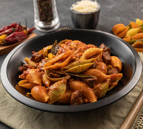 pasta caracoles tricolor con ragu
